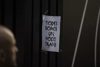 Poster "Todos somos un poco trans" (We're all a little trans) in a street in the centre of Madrid, 28 June 2023.